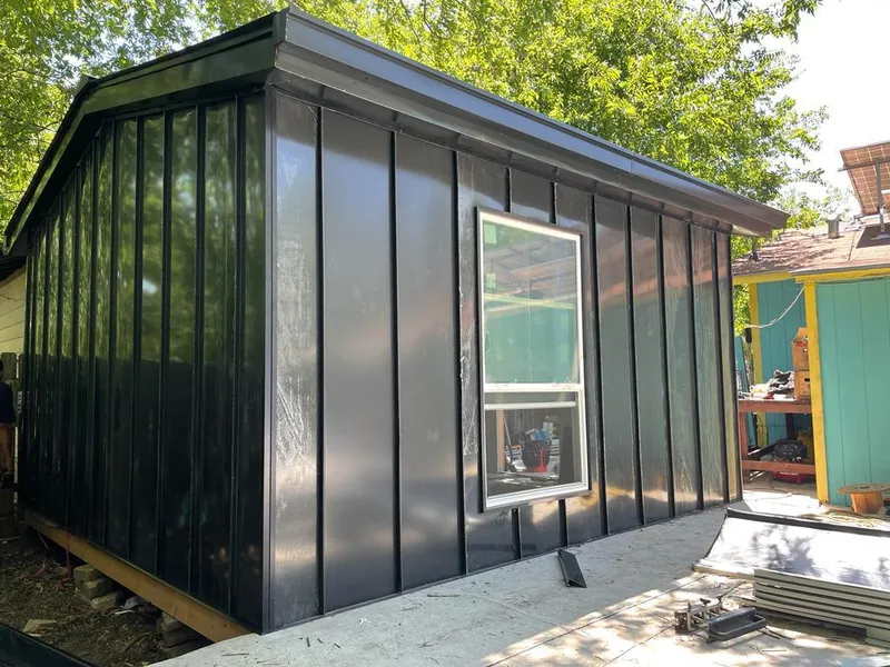 Black standing seam metal wall panels for Metal Roof Installation in Sodus